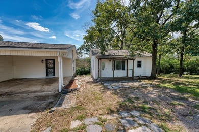 Nestled on 1.7 scenic acres in Hot Springs, Arkansas, this - photo 4