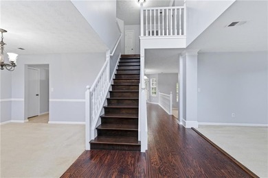 Welcome home to this beautifully designed 4-bedroom, 2.5-bath - photo 2
