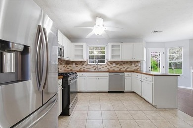 Welcome home to this beautifully designed 4-bedroom, 2.5-bath - photo 7