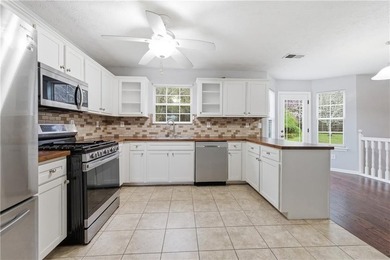 Welcome home to this beautifully designed 4-bedroom, 2.5-bath - photo 9