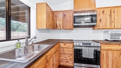 Discover a truly exceptional turnkey home nestled in a quiet