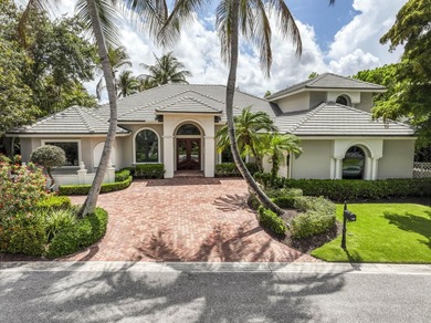 Nestled within the exclusive gated community of Islands of - photo 2