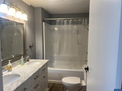 0.13 acre, fully chain link fenced 100x56 yard. 4 bedrooms, 2