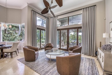 Nestled within the exclusive gated community of Islands of - photo 5