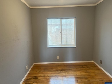 0.13 acre, fully chain link fenced 100x56 yard. 4 bedrooms, 2