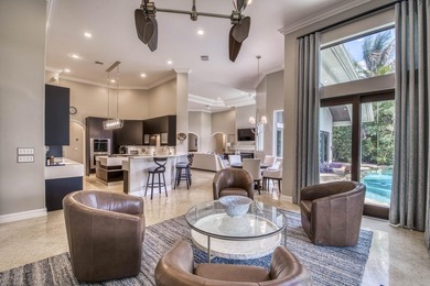 Nestled within the exclusive gated community of Islands of - photo 7