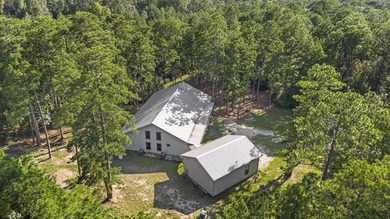 This extraordinary property, INCLUDING BOAT nestled within the - photo 28