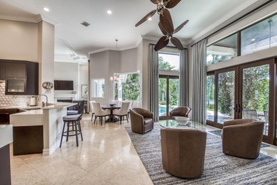 Nestled within the exclusive gated community of Islands of - photo 8