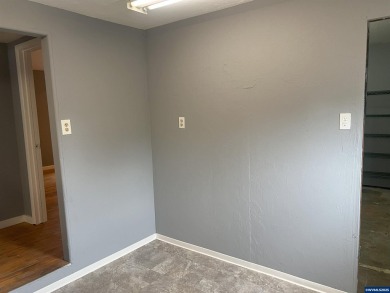 0.13 acre, fully chain link fenced 100x56 yard. 4 bedrooms, 2