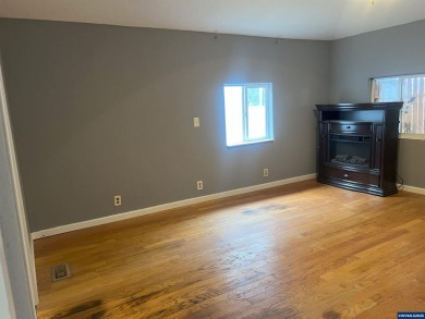 0.13 acre, fully chain link fenced 100x56 yard. 4 bedrooms, 2