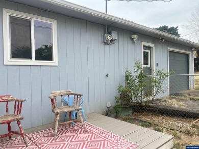 0.13 acre, fully chain link fenced 100x56 yard. 4 bedrooms, 2