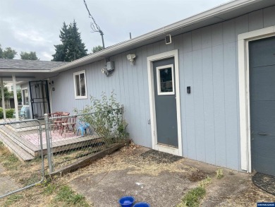 0.13 acre, fully chain link fenced 100x56 yard. 4 bedrooms, 2