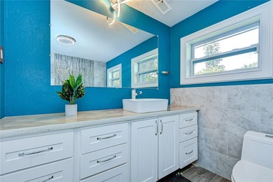 This charming 3-bedroom, 2-bath Gulfport home presents an - photo 22