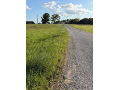 1.5 acres of peaceful, undeveloped land on Lake Bonham. This - photo 2