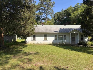 Opportunity awaits with this 1,764 SF home situated on a - photo 2