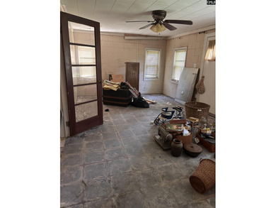 Opportunity awaits with this 1,764 SF home situated on a - photo 3