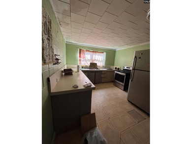 Opportunity awaits with this 1,764 SF home situated on a - photo 6