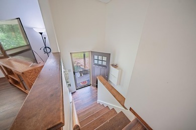 Nestled on over two acres in peaceful Grass Lake, this - photo 8