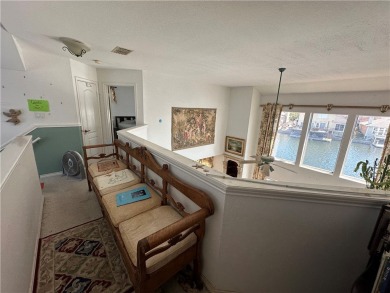 Nestled along a wide canal in Corpus Christi, this 3-bedroom, 2