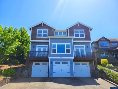 Enjoy stunning views from this elegant custom built home