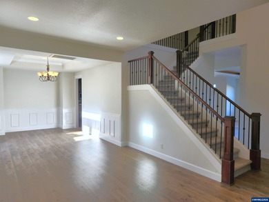 Enjoy stunning views from this elegant custom built home