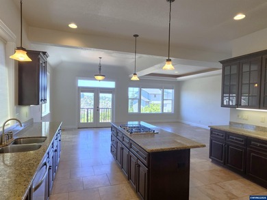 Enjoy stunning views from this elegant custom built home