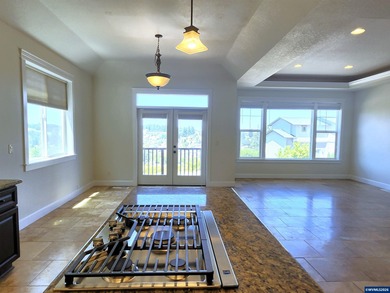 Enjoy stunning views from this elegant custom built home