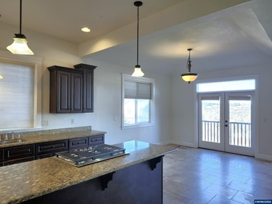 Enjoy stunning views from this elegant custom built home