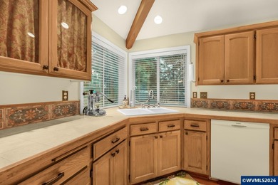 Custom-built single-level home on a spacious 0.24-acre lot with