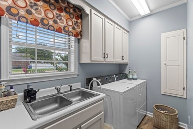 THIS IMMACULATE ONE OWNER HOME IS PERFECT FOR THE EXTENDED