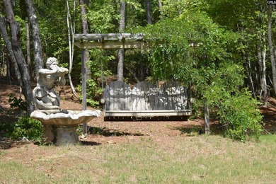 Escape to your own private retreat on 5 beautiful wooded acres - photo 6