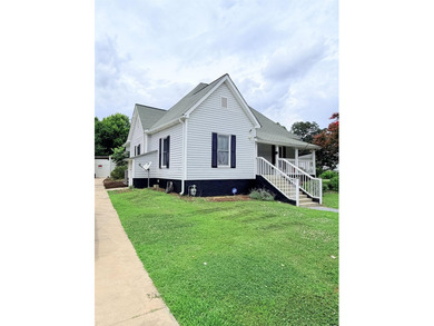 Welcome to 4 Front Street! Step inside this inviting 2-bedroom - photo 2