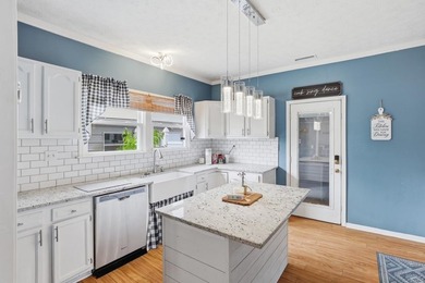 Welcome to 4 Front Street! Step inside this inviting 2-bedroom - photo 3