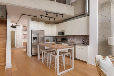 This two-level, 1 bedroom (potential for 2) Gastown loft sits on - photo 8