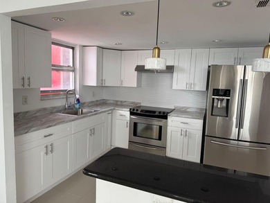 2/2 AT BUCKLEY TOWERS REMODEL TILE FLOOR NEW KITCHEN WITH A - photo 2