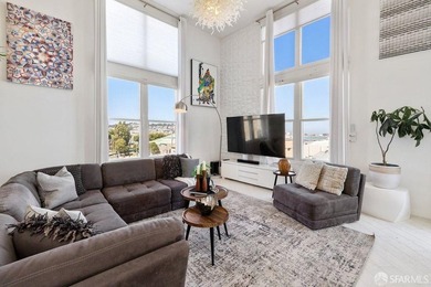 Experience modern, loft-like living in this unique top-floor - photo 3