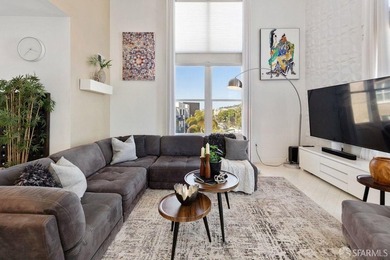 Experience modern, loft-like living in this unique top-floor - photo 4
