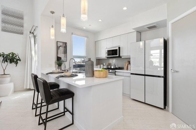 Experience modern, loft-like living in this unique top-floor - photo 7