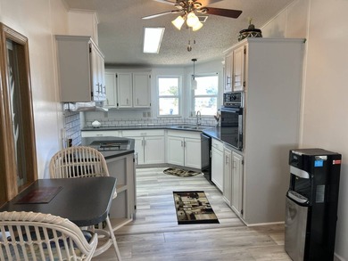 This stunning 2-bedroom, 2-bath home offers the perfect blend of - photo 2