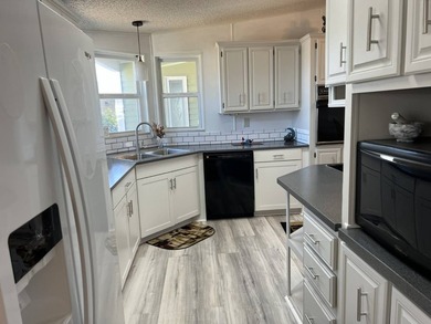 This stunning 2-bedroom, 2-bath home offers the perfect blend of - photo 3