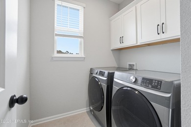 Located in the beautiful gated community of Pablo Cove, this - photo 20