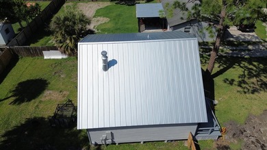 BRAND NEW ROOF! Come see this gem situated on a quarter acre lot - photo 5