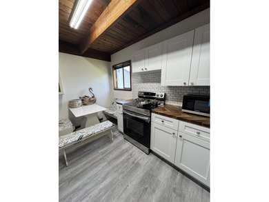 BRAND NEW ROOF! Come see this gem situated on a quarter acre lot - photo 9