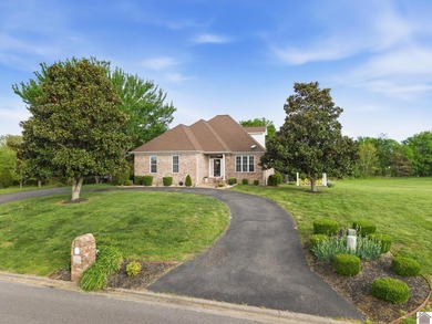 Located on the golf course in Drake Creek, this 4-bedroom, 2 - photo 1