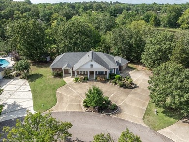 This stunning custom-built home, nestled within a prestigious