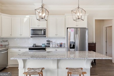 Welcome to this spacious 4 bedroom, 3 bath home in the highly - photo 11