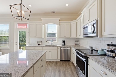 Welcome to this spacious 4 bedroom, 3 bath home in the highly - photo 12
