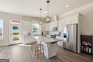 Welcome to this spacious 4 bedroom, 3 bath home in the highly - photo 13