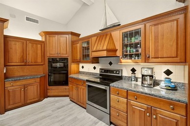 Rare nearly one acre estate in the heart of Clearwater, this