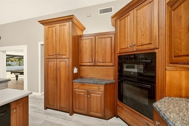 Rare nearly one acre estate in the heart of Clearwater, this